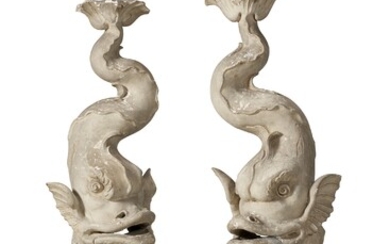 A PAIR OF NORTH ITALIAN PAINTED FIGURES OF DOLPHINS