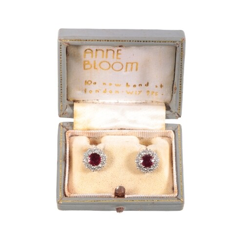 A PAIR OF RUBY AND DIAMOND CLUSTER EARRINGS each round-cut r...