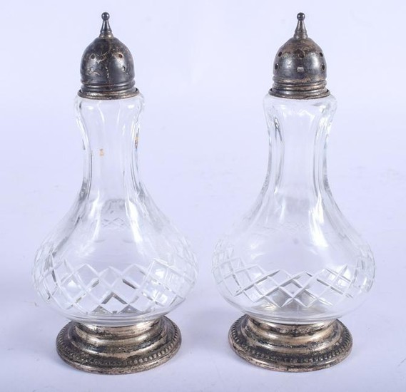 A PAIR OF VINTAGE SILVER CONDIMENTS. 13 cm high.