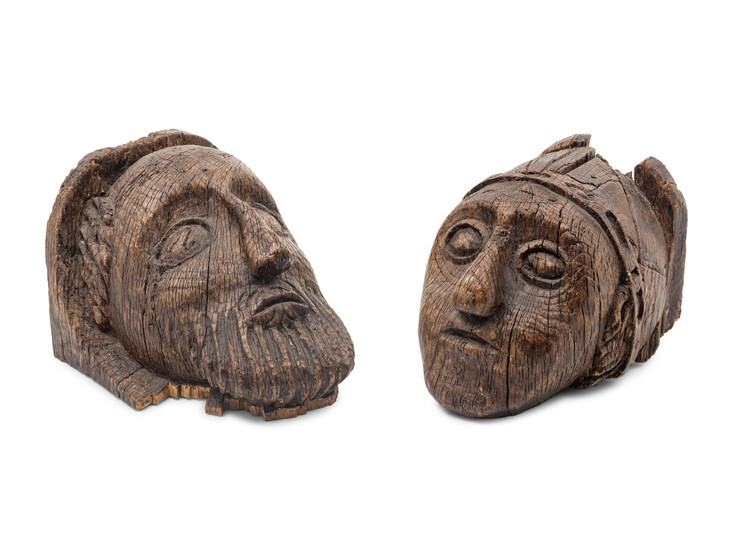 A Pair of Scottish Gothic Carved Oak Heads