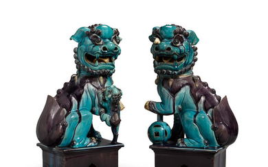 A Pair of Turquoise and Aubergine-Glazed Buddhistic Lions