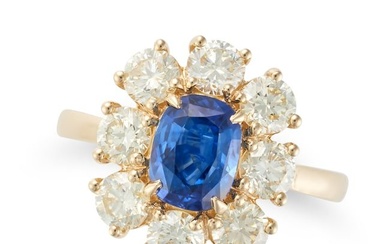 A SAPPHIRE AND DIAMOND CLUSTER RING in 18ct yellow gold, set with a cushion cut sapphire of