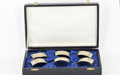 A SET OF ITALIAN STERLING SILVER NAPKIN RINGS