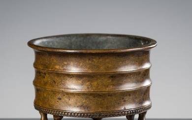 A SMALL BRONZE 'BAMBOO' TRIPOD CENSER, EARLY QING DYNASTY