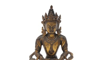 A Sino-Tibetan gilt-bronze figure of Buddha Amitayus