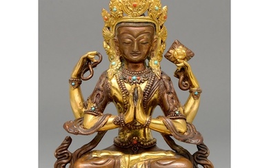 A Sino Tibetan jewelled and gilt bronze figure of a Bodhisat...
