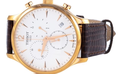 A TISSOT CHRONOGRAPH QUARTZ WRISTWATCH; ref. TO63617A in gold plated stainless steel, matte white dial, 3 registers, date, sapphire...