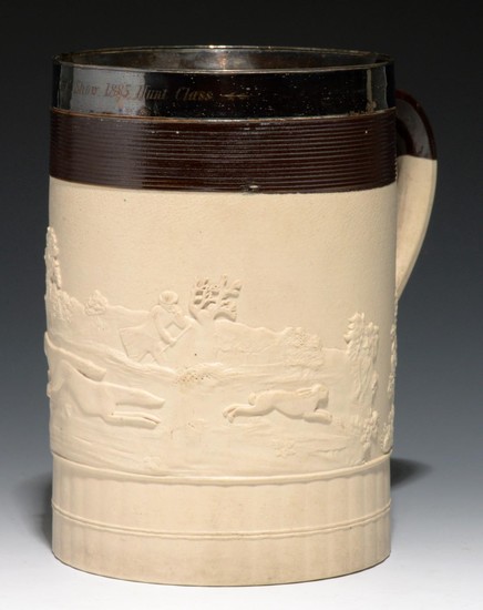 A TURNER BROWN DIPPED AND ENGINE TURNED FELSPATHIC STONEWARE...