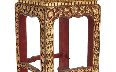 A Thai carved giltwood square small table, 19th century, decorated to the legs and frieze with meandering prunus blossom, 43cm high, 29cm wide 泰國十九世紀 木雕漆金桌