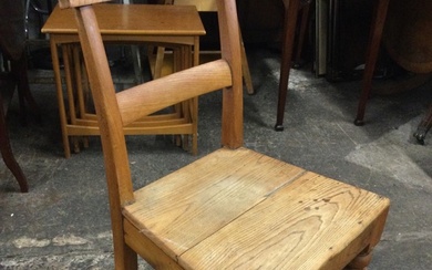 A Victorian elm and ash kitchen chair with shaped crestrail...