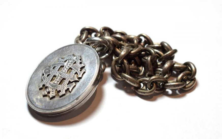 A Victorian locket on chain, locket measures 6.2cm by 4.0cm,...