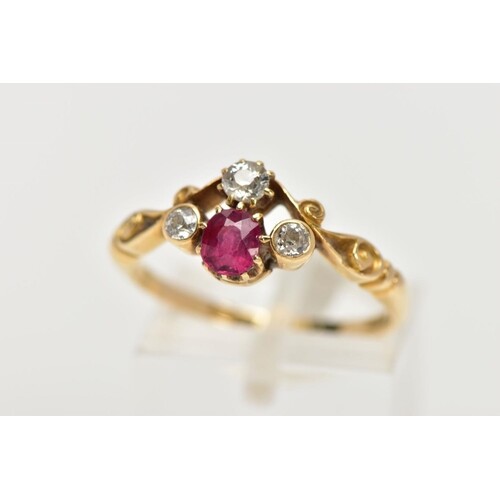 A YELLOW METAL RUBY AND DIAMOND DRESS RING, designed with a ...