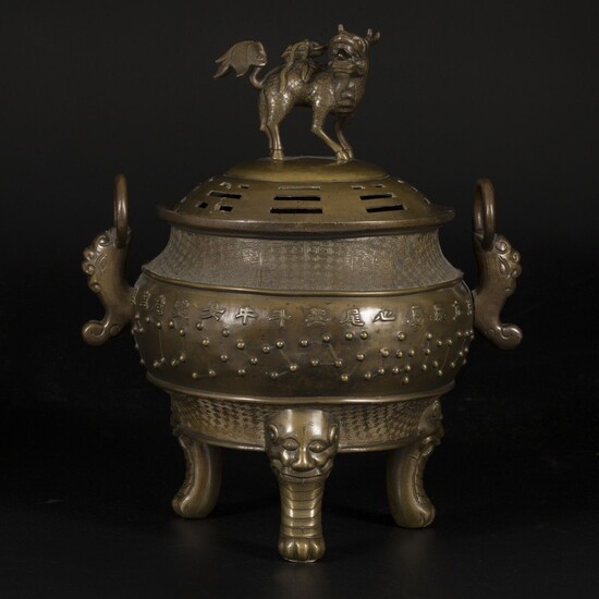 A bronze incense burner decorated with Chinese characters, China, 19th century.