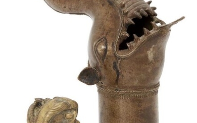 A bronze processional zoomorphic standard finial, and...