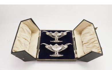 A cased pair of silver Victorian 1906 & 1907 bon bon dishes,...