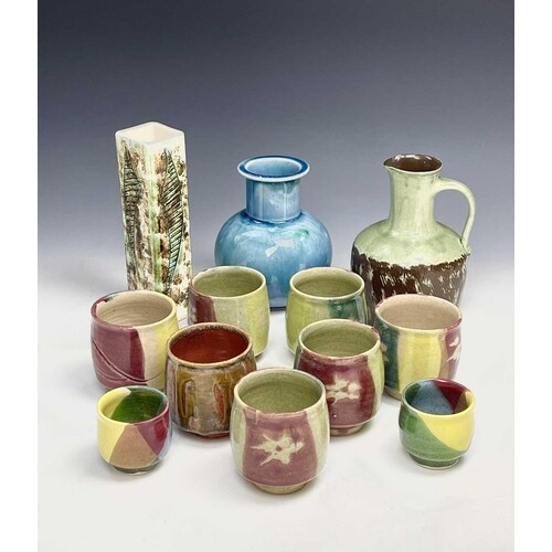 A collection of Alan Brough studio pottery comprising a set ...