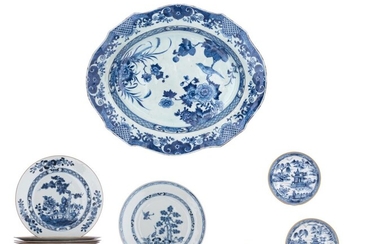 A collection of Chinese blue and white export porcelain plates, tea bowls and saucers, 18thC, largest item 37 x 31,5 cm