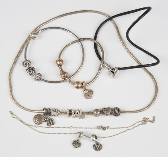A collection of Pandora silver jewellery, comprising a necklace with sliding charms, a bracelet, a b