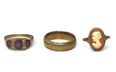 A collection of three 9ct gold rings. Comprising a 9ct...