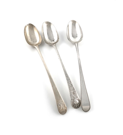 A collection of three George III silver basting spoons
