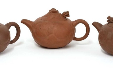 A collection of three Yixing zisha teapots