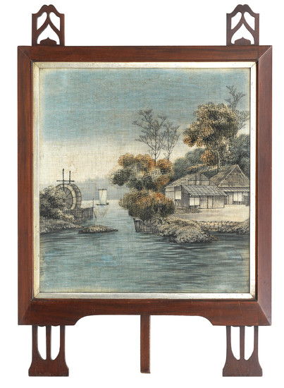A cut and painted velvet landscape mounted within a European Secessionist fire screen