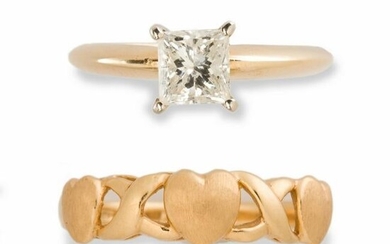 A diamond and fourteen karat gold ring and gold band