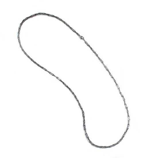 A diamond and sterling silver necklace