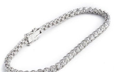 SOLD. A diamond bracelet set with numerous brilliant-cut diamonds weighing a total of app. 6.49 ct., mounted in 18k white gold. F-G/VVS. L. app. 18 cm. Ideal-cut. – Bruun Rasmussen Auctioneers of Fine Art