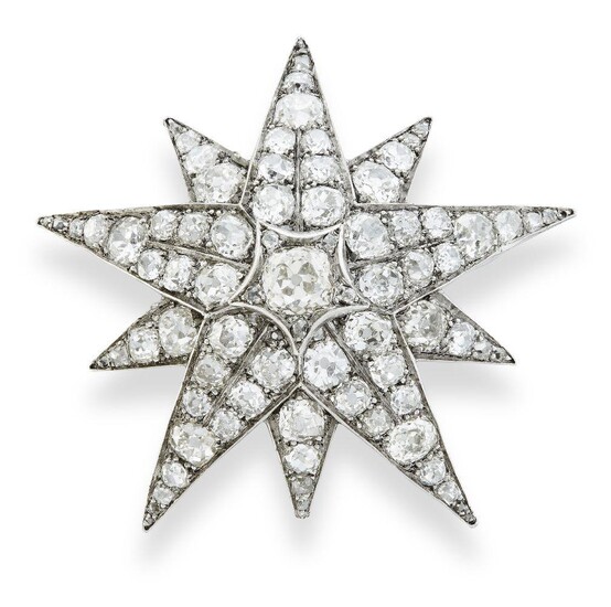 A diamond brooch, designed as a ten pointed star set with graduated old-mine and cushion-shaped diamonds, accented with rose-cut diamond points, mounted in silver and gold, c.1890