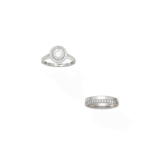 A diamond cluster ring and a diamond ring