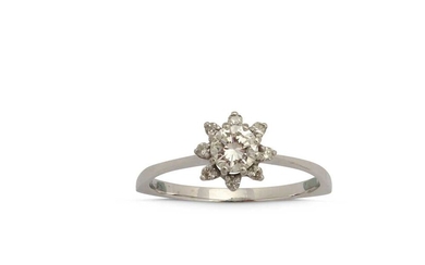 A diamond cluster ring
