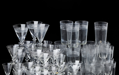A glass set of 64 pieces, Kosta, 1920/30's, clear glass, pantographed decor, partly labelled.