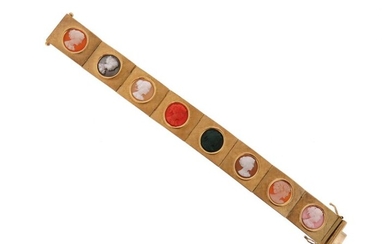 A gold cameo bracelet c.1970, each textured gold rectangular link...