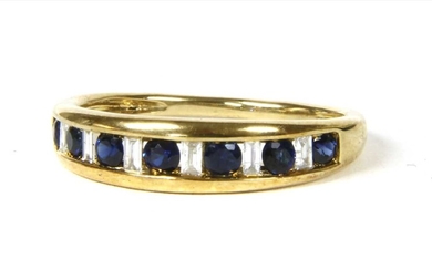 A gold sapphire and diamond half eternity ring