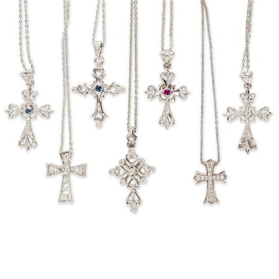 A group of pendant necklaces
