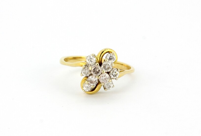 A hallmarked 18ct yellow gold ring set with brilliant cut diamonds, approx. 1ct overall, (N.5).