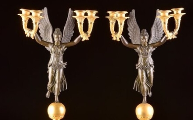 A large pair of four-armed candlesticks, with Victoria (2) - Empire - Bronze (gilt), Bronze (patinated) - Early 19th century