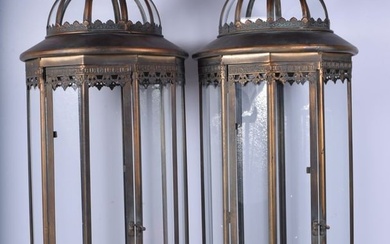 A large pair of metal and glass sectioned lanterns 88 cm (2)