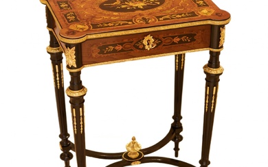 A lovely inlaid wood dressing table with gilded bronze. France...