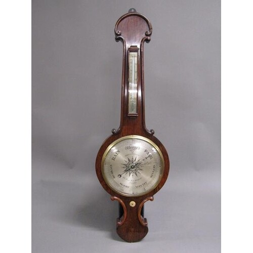 A mid 19c scroll-pattern wheel barometer the 25cms silvered ...