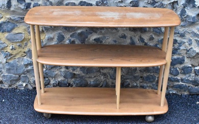 A mid 20th century Ercol elm and beech Baby...