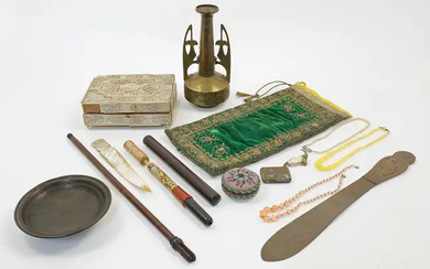 A mixed group of objects of vertu, 20th century, comprising: a mother-of-pearl...