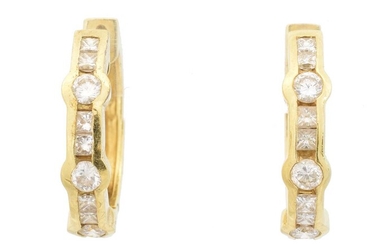 A pair of 18ct gold diamond hoop earrings