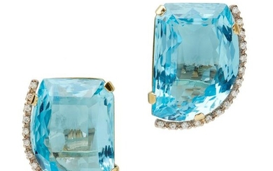 A pair of blue topaz and diamond set earrings