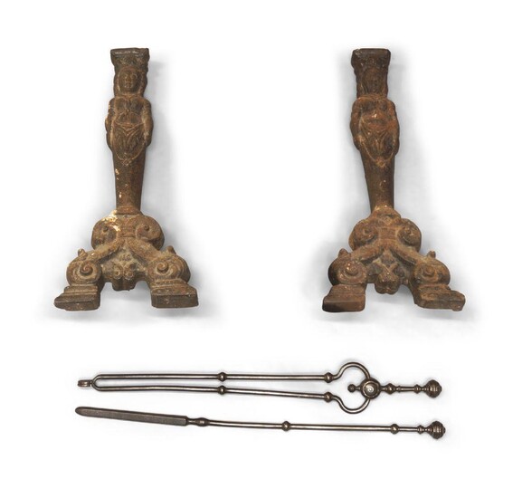 A pair of cast-iron figural andirons of 17th century style, 19th century, the uprights cast as a females, on scroll bases, 62cm high; together with two late Victorian steel fire-tools, comprising tongs and a poker (4)