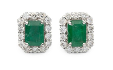 A pair of emerald and diamond ear studs, of chamfered...