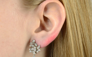 A pair of mid 20th century brilliant-cut diamond floral cluster earrings, with detachable cultured pearl drops.