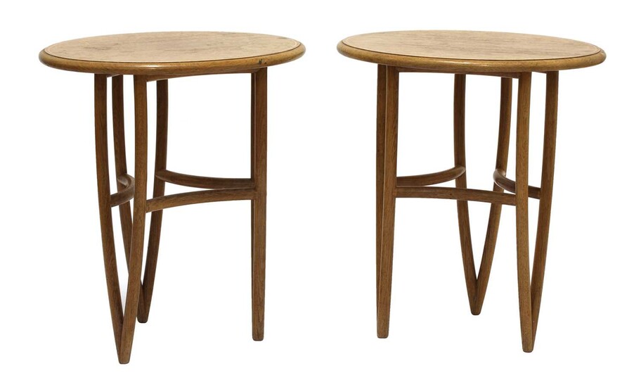 *A pair of oval oak occasional tables