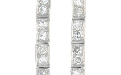 A pair of platinum diamond drop earrings.Estimated